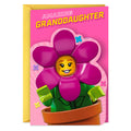 Card with a LEGO flower character and 'Amazing Granddaughter' text on a pink background