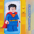 Superman minifigure on a yellow and blue background