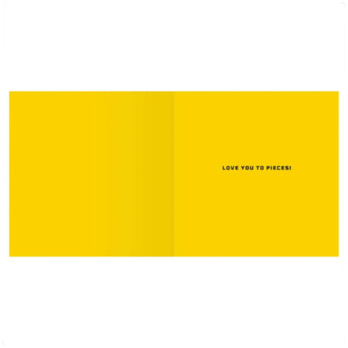 Yellow card with 'LOVE YOU TO PIECES!' text on a white background