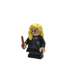 LEGO minifigure with blonde hair and a black outfit holding a wand on a white background