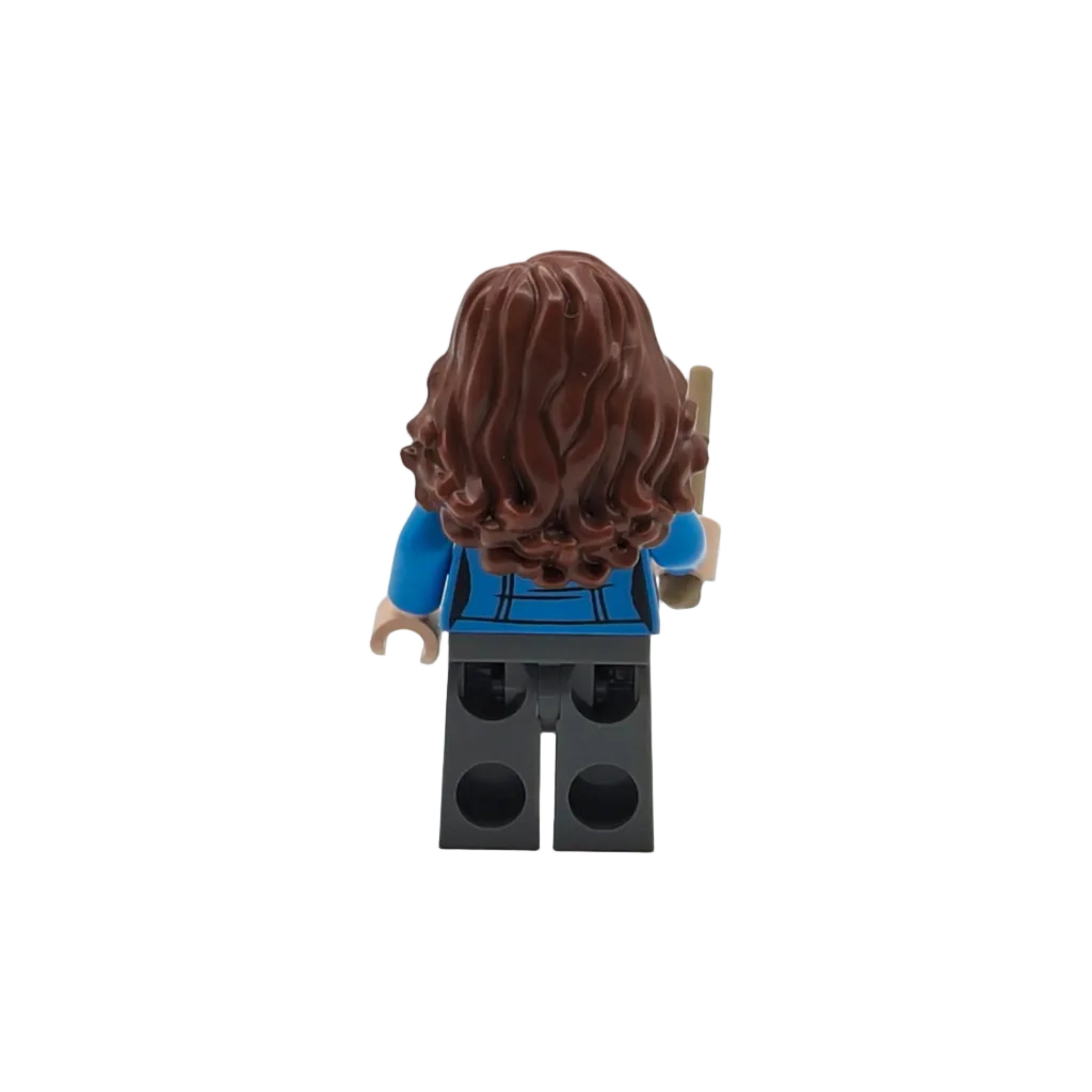 LEGO figure with brown hair and blue shirt on a white background
