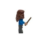 LEGO figure with brown hair and a blue shirt holding a brown rod on a white background