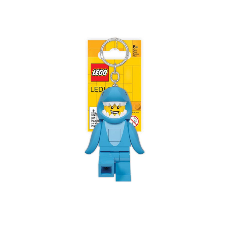 Blue LEGO minifigure keychain with packaging in the background