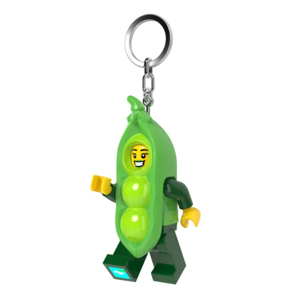 Green pea character keychain with a smiling face on a white background