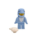 Blue shark-shaped clip with a yellow interior on a white background