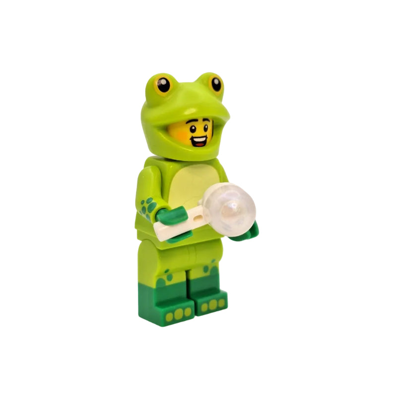 Green toy figure with a face and holding a spoon on a white background