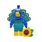 Toy figure of a peacock with a sunflower on a white background