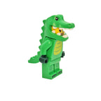 Green toy figure of a character with a leaf on a white background