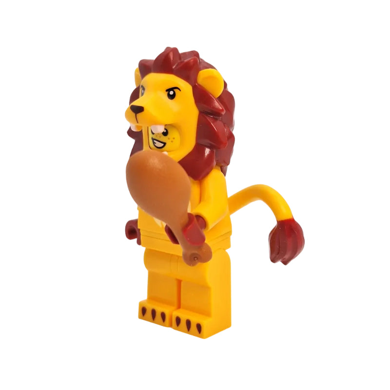 Toy figure of a lion with a yellow weapon on a white background