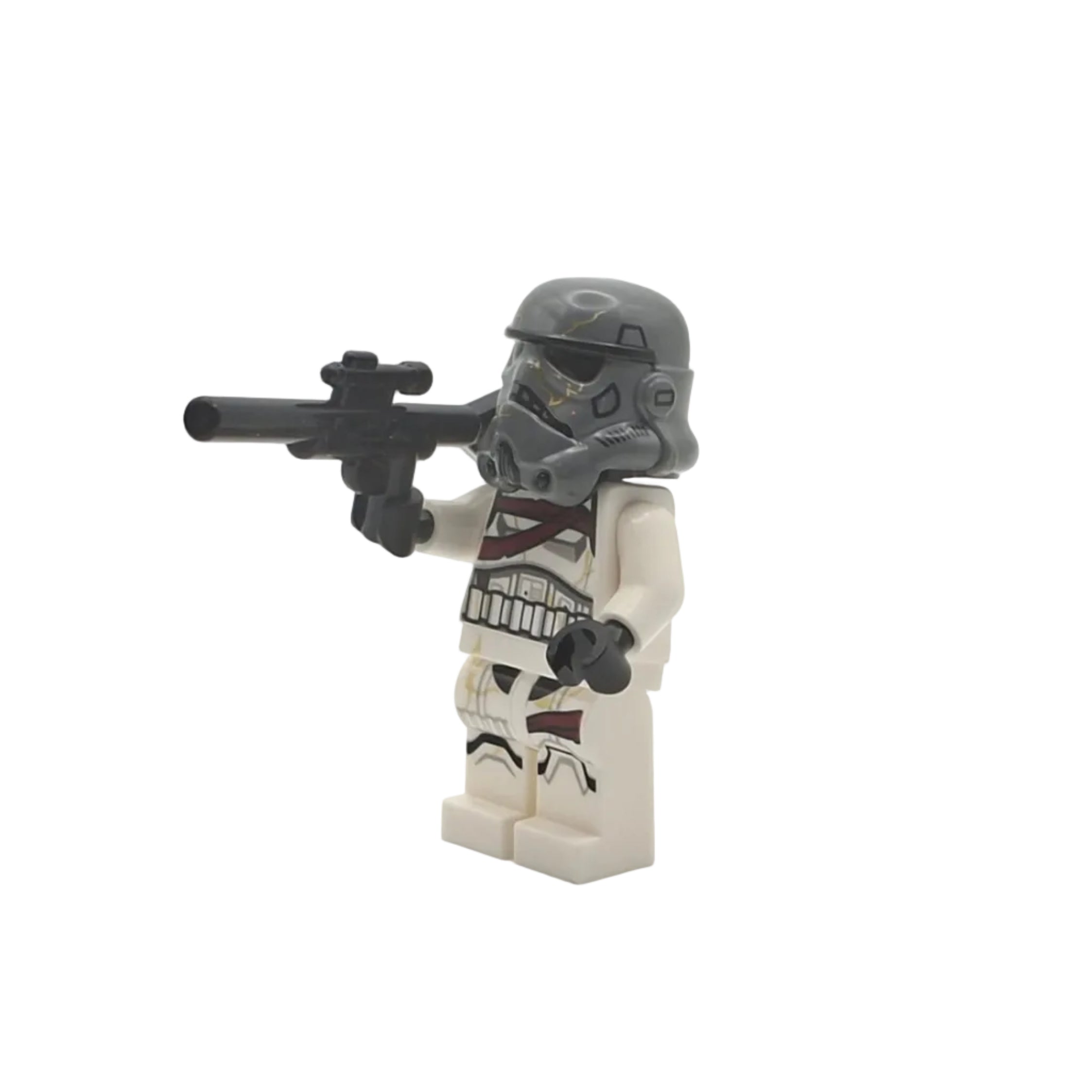 Minifigure of a stormtrooper from Star Wars holding a blaster on a white background